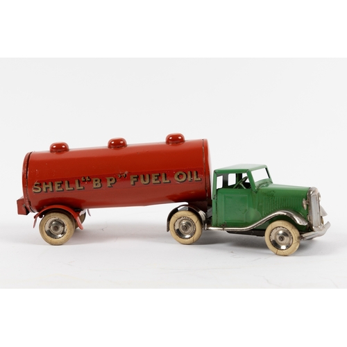 337 - Tri-ang Minic pre-war articulated B.P. & SHELL Fuel Oil Tanker. 31M. Green cab with plated mudguards... 