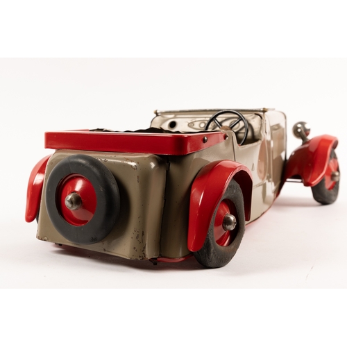 339 - An extremley rare 1937 Lines Bros Tri-ang Series M.T.4. tinplate Magic Sports Car. Impressively larg... 