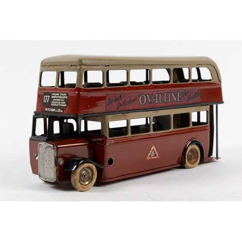 341 - A scarce early issue pre war Tri-ang Minic clockwork powered double decker bus 60M. An example in ma... 