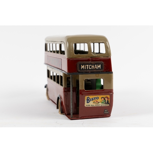 341 - A scarce early issue pre war Tri-ang Minic clockwork powered double decker bus 60M. An example in ma... 