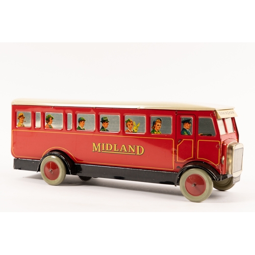 345 - A scarce Chad Valley tinplate clockwork single deck bus. (10005). An example finished in red and cre... 