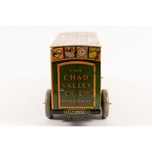 346 - A Chad Valley DENNIS tinplate clockwork box van. In the livery of The Chad Valley Co Ltd, decorated ... 