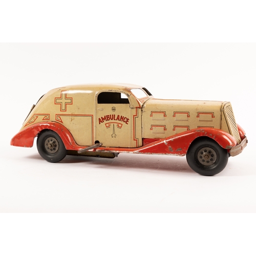 358 - A U.S.A Louis MARX 1930s Heavy Tinplate clockwork Ambulance. Finished in cream body with red chassis... 