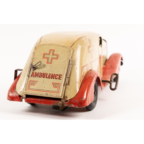 358 - A U.S.A Louis MARX 1930s Heavy Tinplate clockwork Ambulance. Finished in cream body with red chassis... 