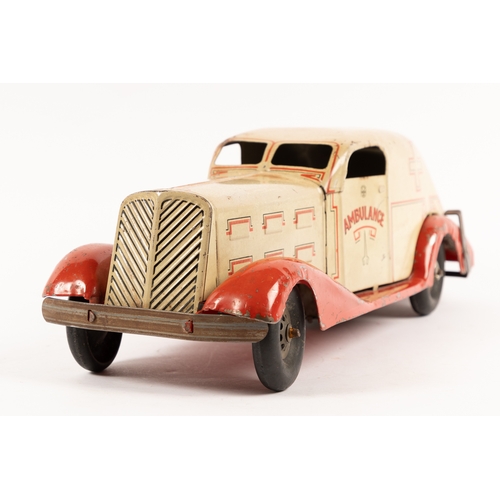 358 - A U.S.A Louis MARX 1930s Heavy Tinplate clockwork Ambulance. Finished in cream body with red chassis... 