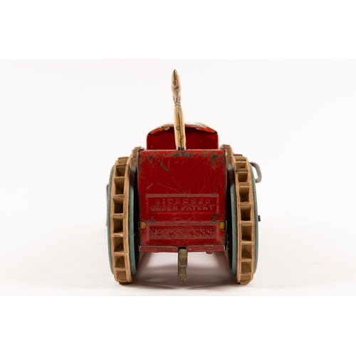 359 - MARX tinplate clockwork bulldozer with blade and driver. Fitted with blue tinplate wheels and origin... 