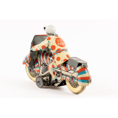 361 - A rare Mettoy tinplate clockwork Clown on Motorcycle. Finished in red, white and blue stripes, clown... 