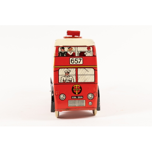 363 - A 1950's Brimtoy tinplate clockwork 'Transport Bus' Trolley Bus. A larger scale example (21cm) in re... 