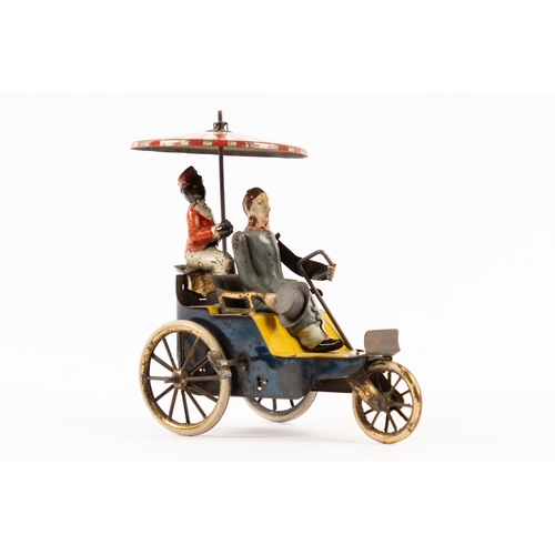 364 - A rare Lehmann clockwork New Century Cycle (345). In dark blue and yellow livery, driver and passeng... 