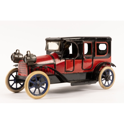 365 - A rare German tinplate clockwork Limousine by K.B.N. BAVARIA (Karl Bub Nurenberg). Finished in a dee... 