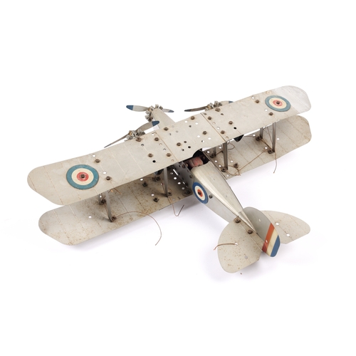 372 - An impressive Meccano tinplate Bi-Plane. Finished in silver RAF livery, fitted with a clockwork mech... 