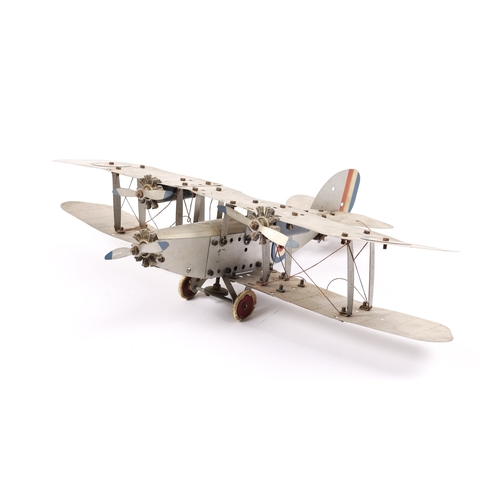 372 - An impressive Meccano tinplate Bi-Plane. Finished in silver RAF livery, fitted with a clockwork mech... 