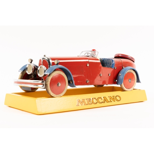 378 - A rare 1930's No.2 Meccano Constructor Car. A round tail example in red with blue mudguards, blue se... 