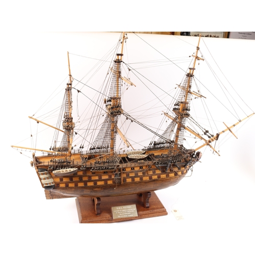 92 - An impressive model of HMS Victory. With fully detailed rigging but with no sails, 3 decks with cano... 