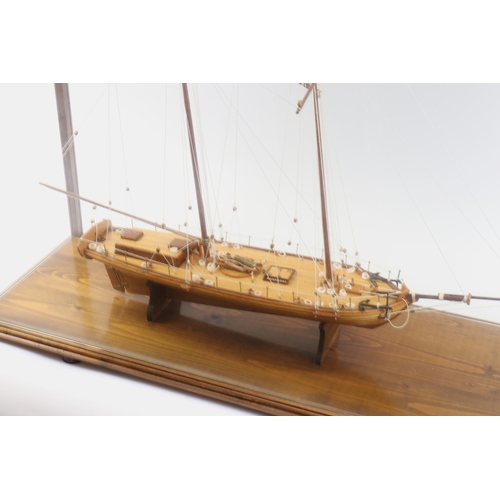 93 - A fine wooden model of a two masted Revenue Cutter 'Dallas' 1815. 81.5cm Approx length, height to to... 