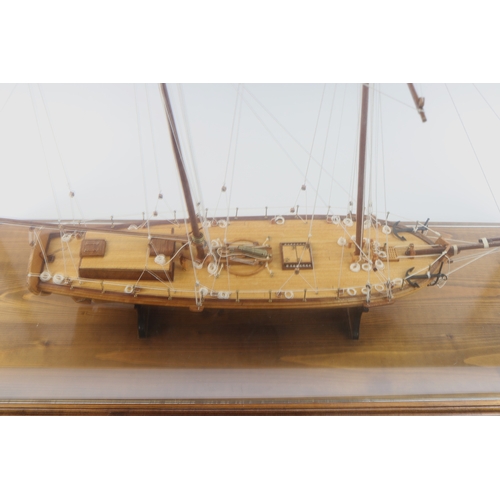 93 - A fine wooden model of a two masted Revenue Cutter 'Dallas' 1815. 81.5cm Approx length, height to to... 