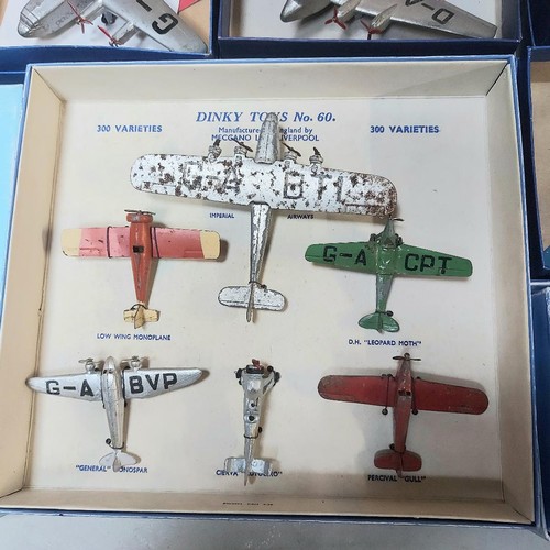 295 - A collection of Dinky aeroplanes in various conditions. Including No.63 MAYO COMPOSITE AIRCRAFT in a... 