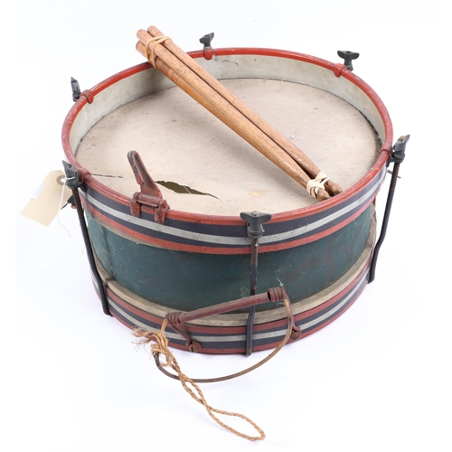 168 - A small military drum, brass body with applied post 1902 Arms badge, 2 pairs of drumsticks. GC (tear... 