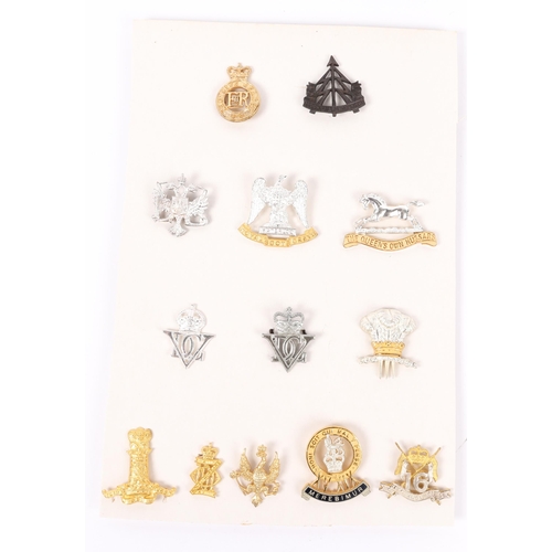 186 - 12 Cavalry officer's cap badges in silver and gilt, from stock held by Gaunt for Provisioning Office... 