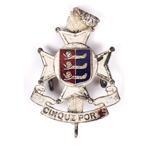 194 - A fine Cinque Ports Regiment officer's silvered cap badge, with red and blue enamelled centre piece.... 