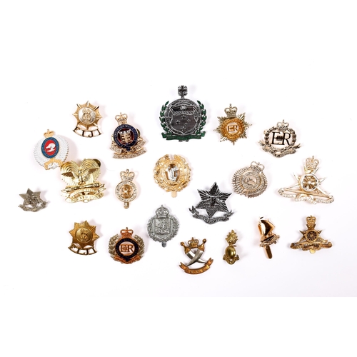 200 - 30 post WWII, including ERII and anodised colonial, commonwealth and other cap badges, including Jam... 