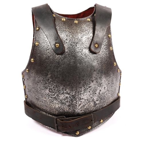 346 - An 18th century breast and backplate, edged with domed brass rivets and with replacement leather sho... 