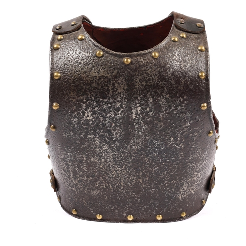 346 - An 18th century breast and backplate, edged with domed brass rivets and with replacement leather sho... 