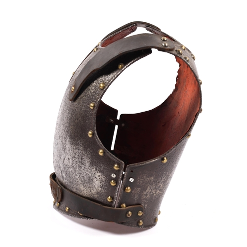 346 - An 18th century breast and backplate, edged with domed brass rivets and with replacement leather sho... 