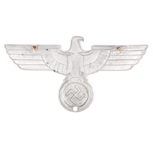 87 - A Third Reich cast alloy eagle and swastika, 28