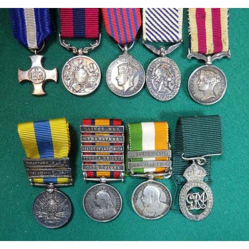 80 - A small collection of 22 miniature medals including: DSC EIIR issue, DCM Vic issue, George Medal Geo... 