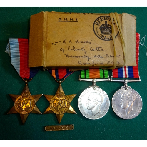 70 - Four: 1939-45 star, Burma star with Pacific clasp, Defence and War, in their Admiralty box addressed... 