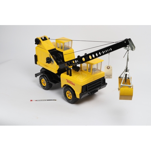 2 - A 1970's heavy duty tinplate TONKA TOYS Crane Truck. Finished in bright yellow with black chassis an... 