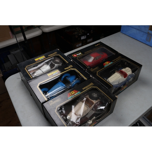 29 - 10 Bburago 1:18 scale Cars. Mercedes SSKL in white and black. 2x Bugatti Type 59 in French Racing Bl... 