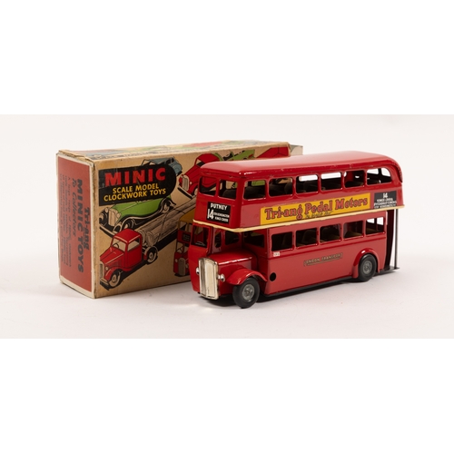 326 - Tri-ang Minic Double Decker bus in red. Tri-ang Pedal Motors to one side and Penguin to the other si... 