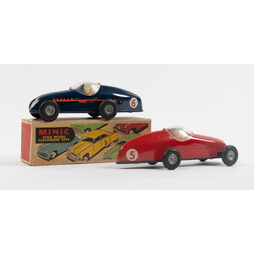 327 - A Tri-ang Minic No.1 Racing car in dark blue with red plastic exhaust  to one side, clear plastic co... 