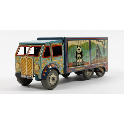 370 - A large example of the 'Bingo's Circus' clockwork 6-wheel Van. In two-tone blue livery with two anim... 