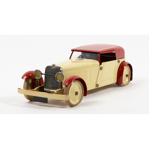 373 - A scarce Meccano clockwork No.1 Constructor Car. An example in cream with red roof, mudguards and in... 