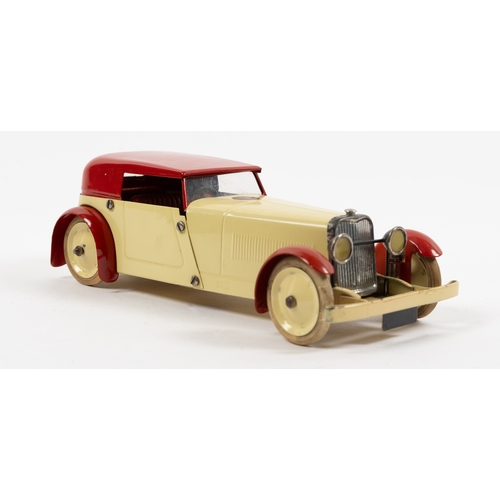 373 - A scarce Meccano clockwork No.1 Constructor Car. An example in cream with red roof, mudguards and in... 