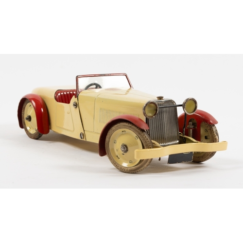 374 - A scarce Meccano clockwork No.1 Constructor Car. An open topped example in cream with red interior, ... 