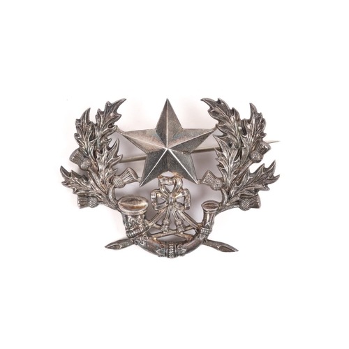 241 - An officer's scarce small size silver coloured Cameronians badge for the 