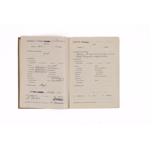 60 - An interesting record book for Deutschen Volkschute, cover marked with eagle and swastika and 