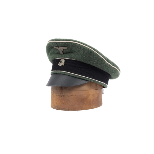 153 - An old replica of a Third Reich SS NCO's cap, metal badges. GC (chin strap missing). £20-30