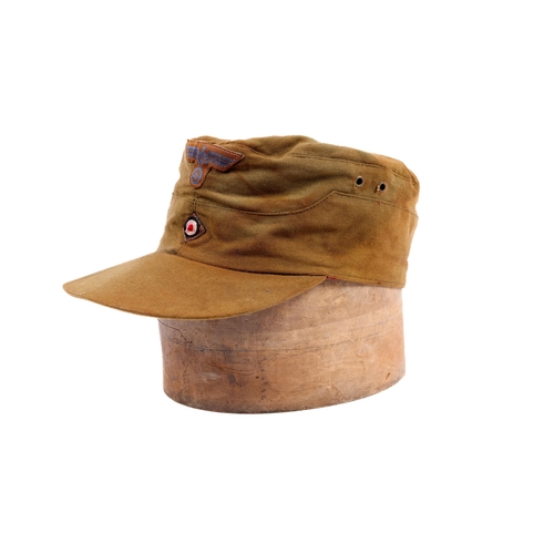 155 - A Third Reich D.A.K. type mans field cap, woven insignia on khaki material. VGC £70-80