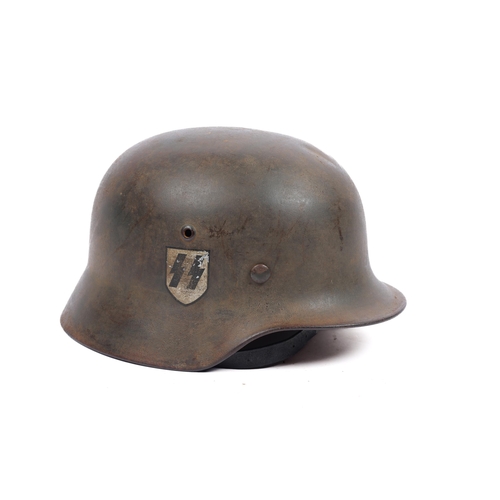 161 - A scarce Waffen SS M1935 pattern helmet, SS decal on right side, leather lining. In untouched GC £70... 