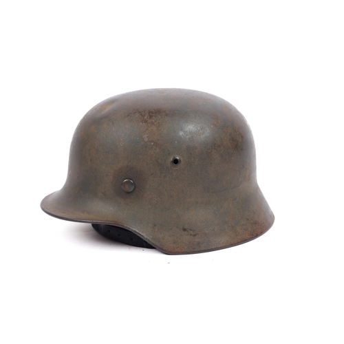 161 - A scarce Waffen SS M1935 pattern helmet, SS decal on right side, leather lining. In untouched GC £70... 