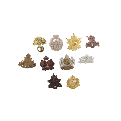 244 - 21 post 1920 Canadian cap badges, including Three Rivers Regiment, Algonquin Regiment, Rocky Mountai... 