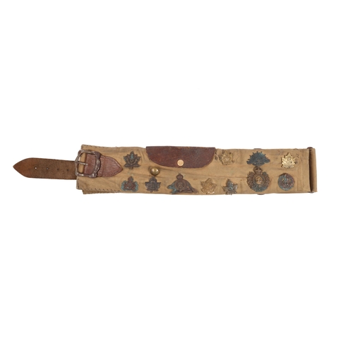 247 - A WWI Canadian soldiers badge belt assembled from a money belt, 18 badges affixed including: CEF 23r... 