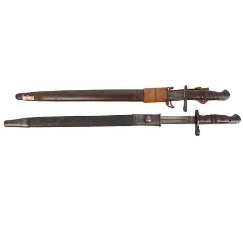 302 - A P17 bayonet in a 1907 pattern scabbard, GC; another in its scabbard, badly pitted. (2) £80-100