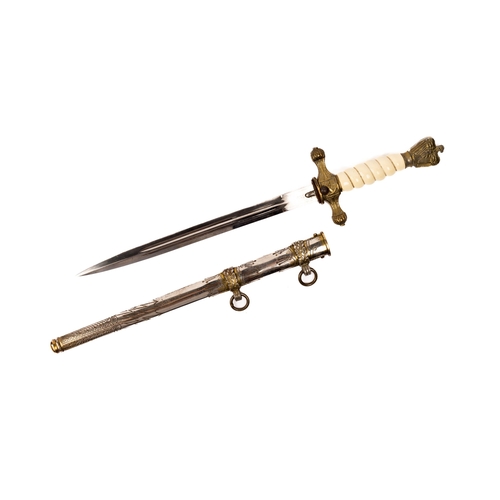 176 - A Third Reich Naval officer's dagger, gilt washed alloy mounts, white ivorine grip, in its steel sca... 