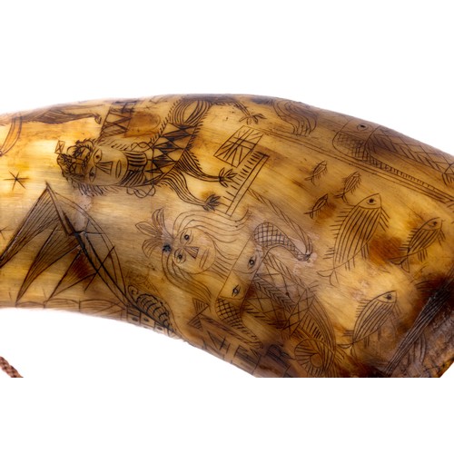 310 - A Georgian powder horn heavily decorated with scrimshaw carving, including 